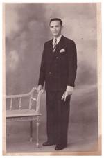 Photograph of man, the back is in Polish, something about ‘8 years’.