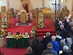 A photo of the funeral of John Huk.